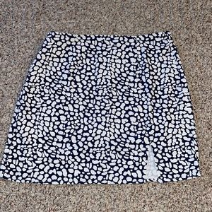 Super cute skirt, small slit in front. Never worn